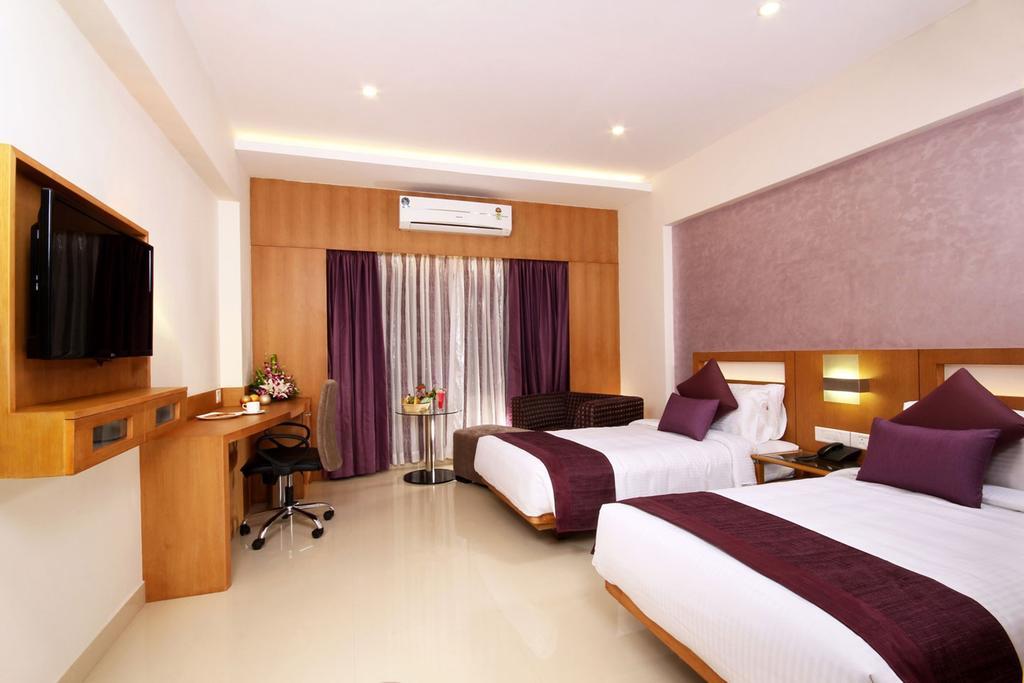 Hotel Chrysoberyl Kottayam Ruang foto