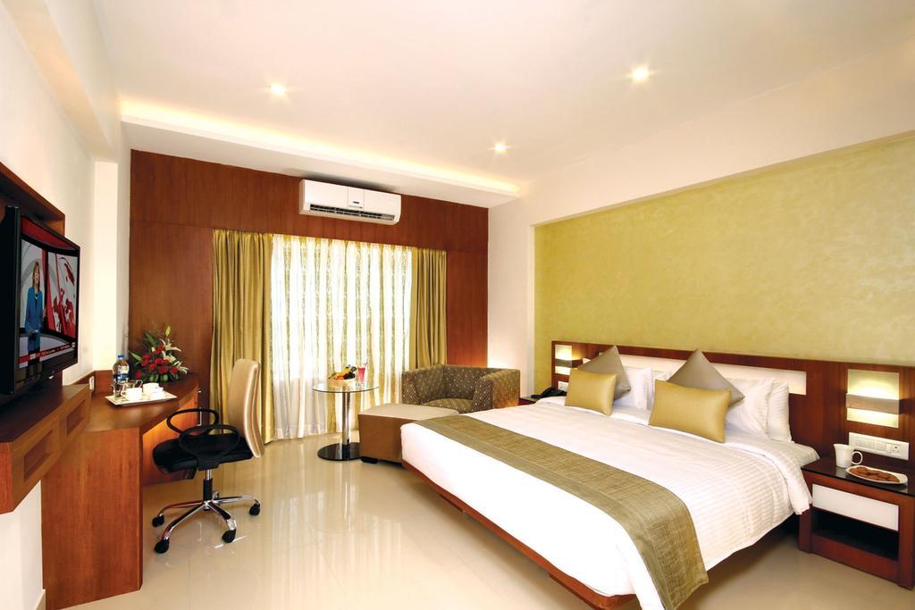 Hotel Chrysoberyl Kottayam Ruang foto